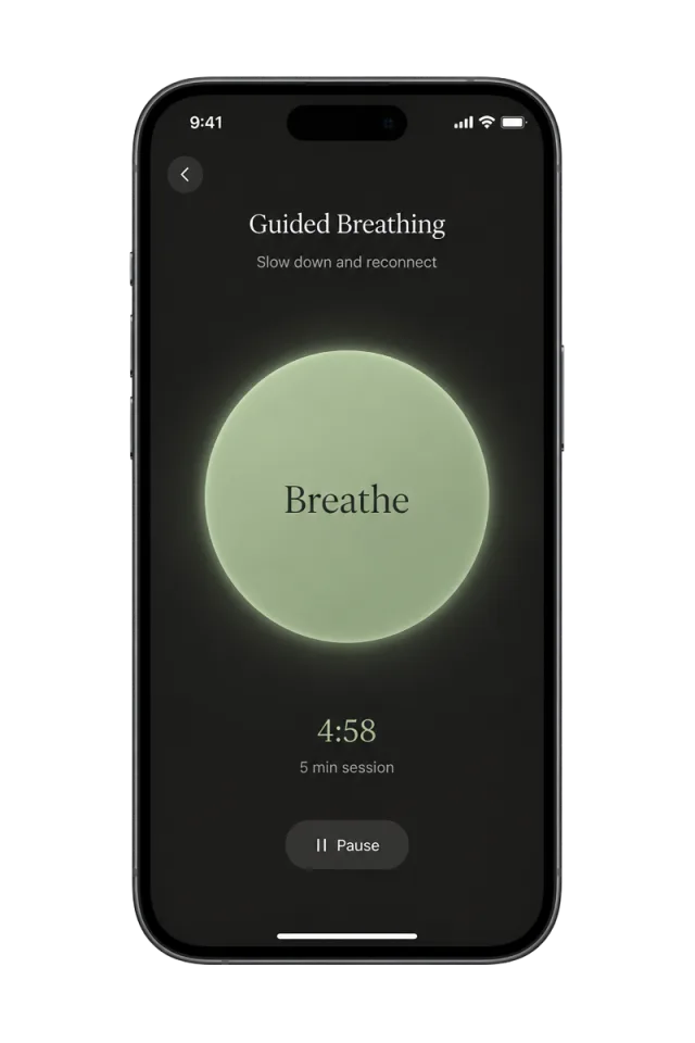Guided breathing screen in the Reframer app with a glowing sage circle